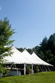 image of outdoor  - A large white wedding tent set up for an outdoor function or banquet - JPG 