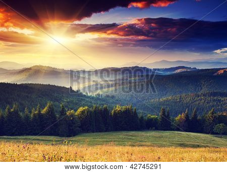 Picture or Photo of Majestic sunset in the mountains landscape. Dramatic sky. Carpathian, Ukraine, Europe.