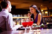 pic of restaurant  - Photo of couple sitting at the table in restaurant - JPG 