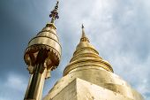 The golden pagoda of Wat Phra Singh is a Buddhist temple in Chiang Mai, Northern Thailand.