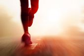 image of fitness  - Runner athlete feet running on road - JPG 