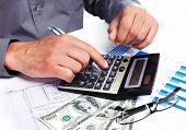 pic of money  - Hand with a calculator - JPG 