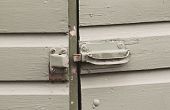 picture of latch  - Old painted latch on a wooden shed left open - JPG 