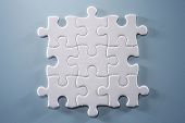 pic of puzzle  - Puzzle pieces isolated on the blue background - JPG 
