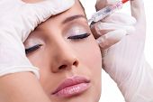 stock photo of medical doctors  - Cosmetic injection of botox - JPG 