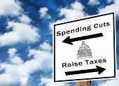 picture of finance  - Direction sign for raising taxes or cutting spending - JPG 