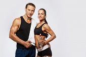 pic of fitness  - Athletic man and woman after fitness exercise - JPG 