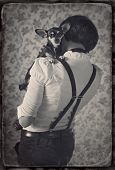 stock photo of dog  - Female gangster in white shirt and little dog
 - JPG 