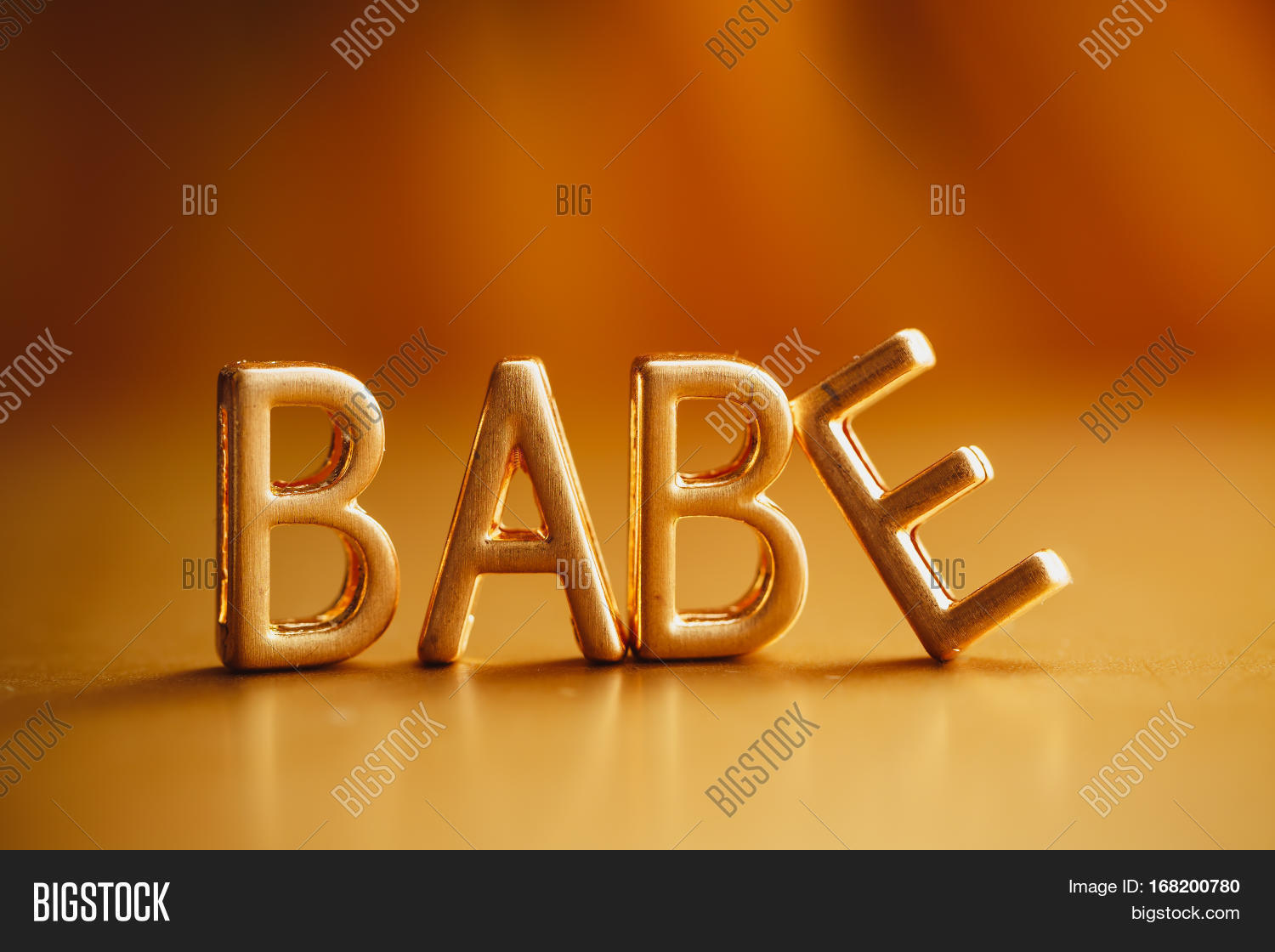 Single Word 'Babe' Gold Lettering. Image & Photo Bigstock