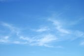 stock photo of contrast  - Fantastic soft white clouds against blue sky - JPG 