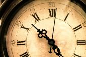 picture of clockface  - Old stained vintage clock closeup with roman numbers - JPG 