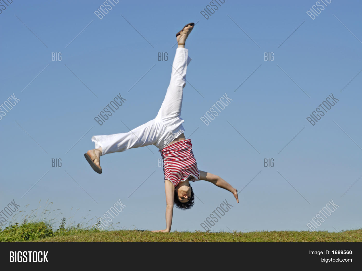 Adult Woman Doing Cartwheel Image & Photo Bigstock