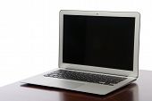 foto of mac  - New Modern popular laptop thin computer light weight with clipping path and black screen isolated on a white background - JPG 