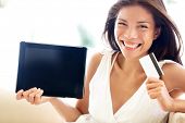 image of internet  - Internet shopping woman online with tablet pc and credit card - JPG 