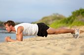 pic of fitness  - Crossfit training fitness man doing plank core exercise working out his midsection core muscles - JPG 