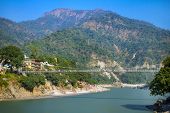 stock photo of bridge  - Laxman Jhula bridge over Ganges river in Rishikesh - JPG 
