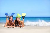 pic of beach  - Beach travel couple having fun snorkeling - JPG 