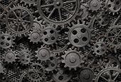 picture of industrial  - many old rusty metal gears or machine parts - JPG 