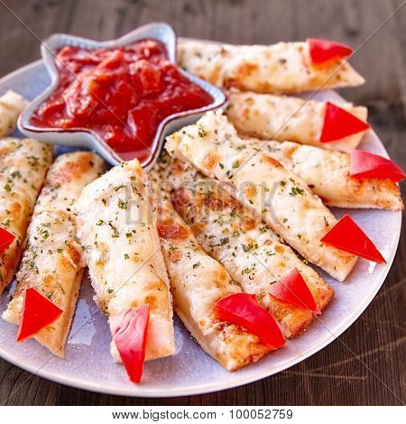 Cheesy Breadsticks Witch Fingers