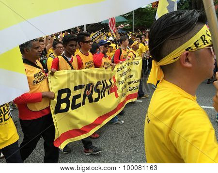 Supporters in yellow shirts demonstrating for Bersih Rally Malaysia