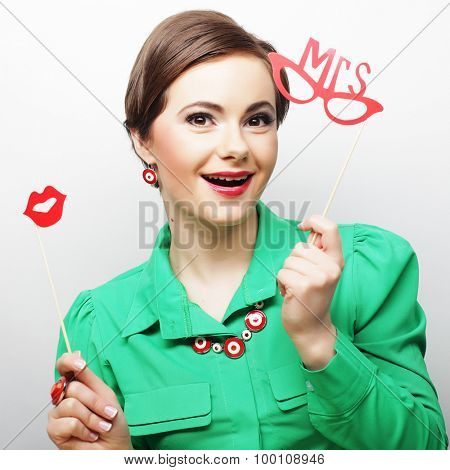 Attractive playful young woman ready for party - falce lips and glasses  