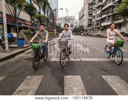 CHENGDU CHINA - MAY 20 2012: Unidentified people on the street of Chengdu China. With more than 14 million people Chengdu is the fourth most populous city in mainland China.