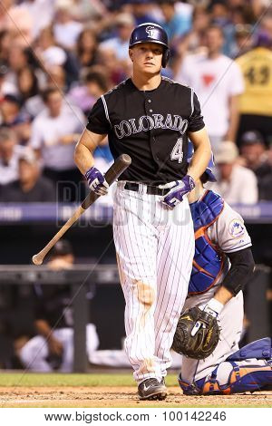 DENVER-AUG 21: Colorado Rockies catcher Nick Hundley waits for a pitch during a game against the New York Mets at Coors Field on August 21, 2015 in Denver, Colorado.