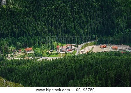 Bird view from Suhardul Mic mountain to populated valley in Red Lake AKA Lacu Rosu area, Carpathians Romania.