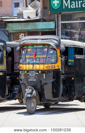 Auto Rickshaw Taxi On A Road In Srinagar, Kashmir, India.