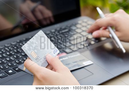 Nakhonratchasima, Thailand - August 1, 2015 : Credit Card Visa Brand With Pen On Keyboard.