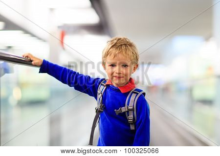 little boy travel in the airport or train station