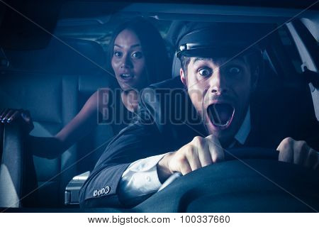 Male chauffeur with woman on back seat gets into car crash and makes ridiculous face