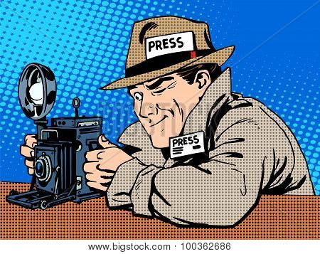 Photographer paparazzi at work press media camera. The reporter