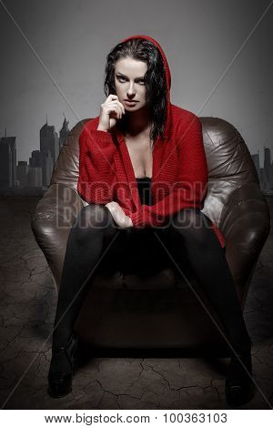Sexy Woman In Desert Sitting On Sofa