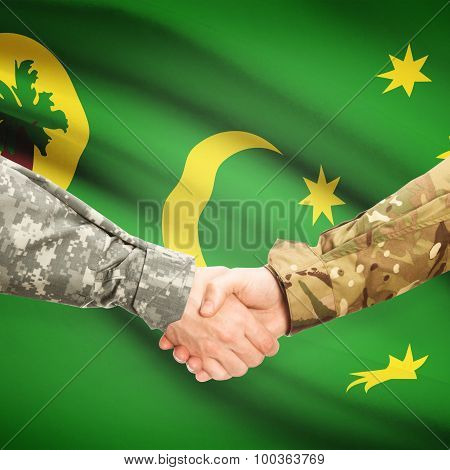 Men In Uniform Shaking Hands With Flag On Background - Cocos (keeling) Islands