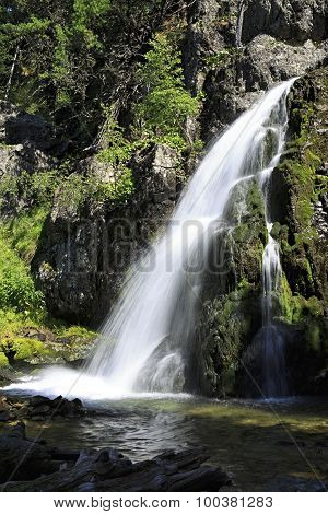 Scenic Muehtinsky waterfall in Altai Republic.