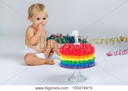 Baby Girl Celebrating Her First Bithday With Gourmet Cake.
