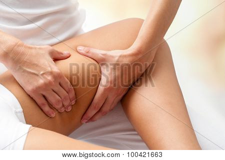 Osteopathic Massage On Female Thigh.