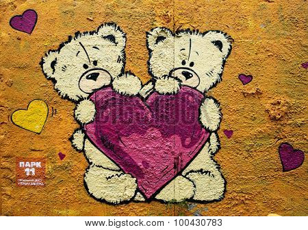 MOSCOW - SEPTEMBER 03, 2015: Graffiti on a urban wall (near Dmitrovskaya Subway Station). Teddy bears and heart