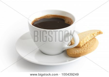 White Ceramic Cup And Saucer With Black Coffee And Shortbread Biscuits. Isolated.