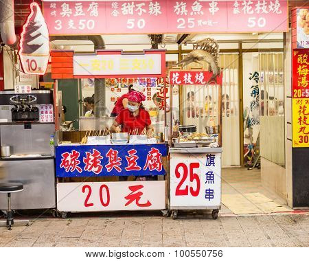 Street Food Vendor At  Danshui Old Street And Waterfront