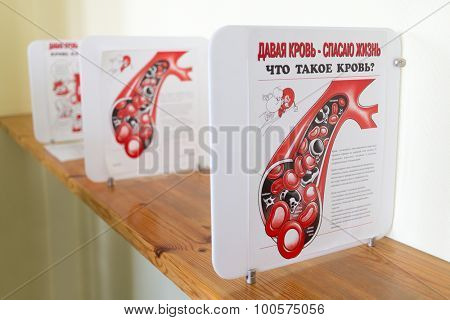 MOSCOW - November 10, 2014: Advertising poster about blood donation. Text reads: Donating blood - saved lives. What is blood? and reference information about blood follows