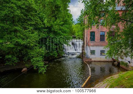 OSLO, NORWAY - 8 JULY, 2015: Alongside Akerselva river passing through city with charming pathways a