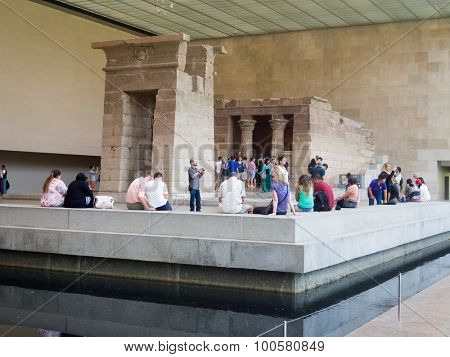 NEW YORK,USA- AUGUST 18,2015 : Visitors at the egyptian Temple of Dendur on the Metropolitan Museum of Art