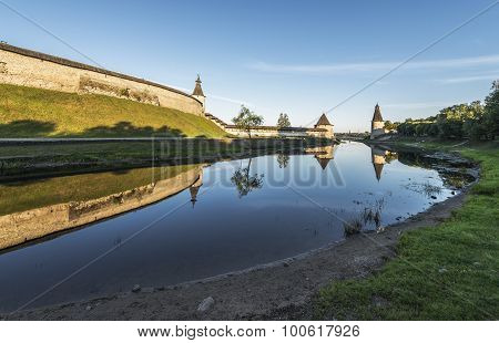 Pskov Kremlin From The Side Of The Pskova River At Sunrise.