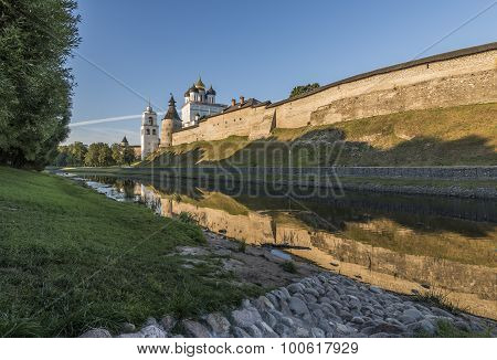 Pskov Kremlin From The Side Of The Pskova River At Sunrise.