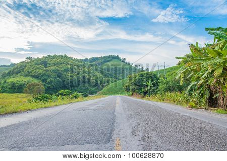 Mountain road blue sky