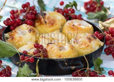 Appetizing baked apples with fresh Kalina