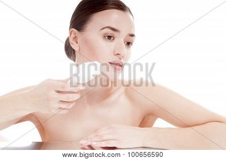 Woman With Brush For Deep Cleansing Facial. Skin Care Concept. High Technology Beauty.