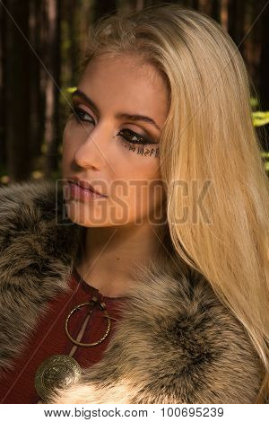 Scandinavian  Girl With Runic Signs In A Wood